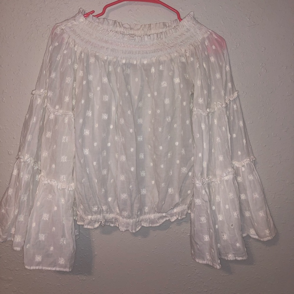 White blouse with long bell sleeves